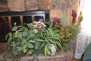 lot 54 image: Artificial Purple and Greenery Arrangements