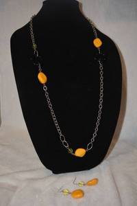 lot 205 image: Contemporary silver finish and butterscotch colored station bead necklace and matching earring demi parure set. 18L