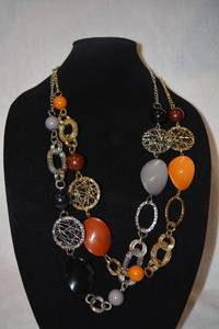 lot 207 image: (2) Contemporary wire mesh and potato chip station bead necklaces. Both 16L. Oner each gold and silver finish.