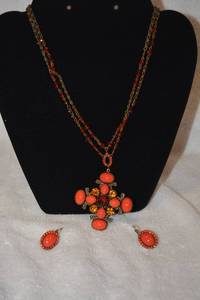 lot 211 image: Signed Liz Palacios (S.F.) retro coral orange cabochon and Swarovski crystal necklace with decorated cross pendant and matching earrings. Has hang tag. 18-20L