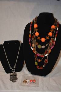 lot 214 image: Contemporary retro color jewelry selection. Includes articulated owl necklace and more