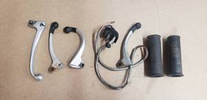 lot 141 image: Lot of Honda Handle Bar Brake Levers & Handle Bar Grips