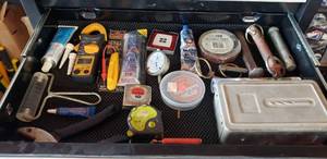 lot 413 image: Lot of Miscellaneous Tools - Tape Measures, Volt Meter, Adhesives & More