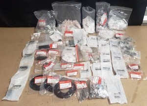 lot 537 image: Large Lot of OEM Honda Parts & Hardware