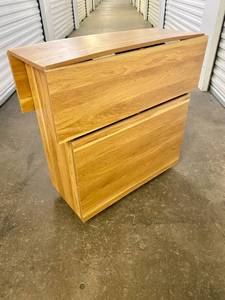 lot 35 image: Drop Leaf Storage Table on Wheels