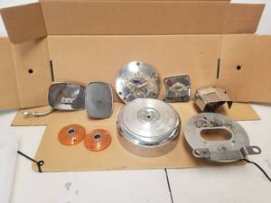 lot 77 image: Selection of Harley Davidson parts