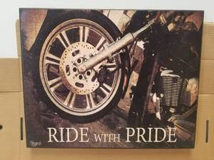 lot 146 image: Ride with Pride motorcycle artwork decor.