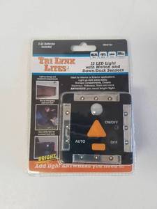 lot 170 image: LYNX 12-LED LIGHT WITH MOTION AND DAWNDUSK SENSORS  BLACK- #00027B - Total of 4