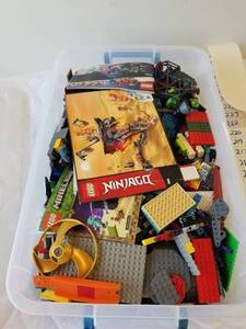 lot 116 image: Generous amount of Lego pieces - possible complete sets in bin  13 pounds of Legos