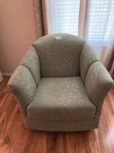 lot 95 image: Green chair - rocker and swivel