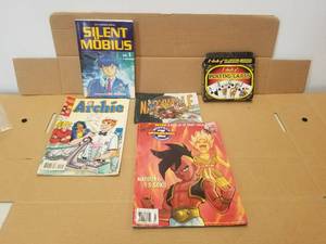 lot 206 image: Selection of comics, gaming books