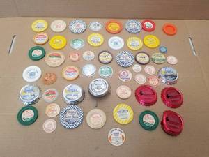 lot 208 image: Selection of glass milk bottle caps