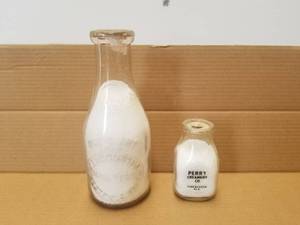 lot 209 image: Selection of 2 vintage glass milk bottles