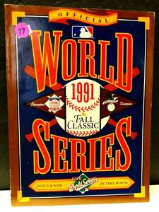 lot 77 image: 1991 Official World Series Souvenir Scorebook MLB Twin s Braves with Autograph of Writer. JOE FALLS