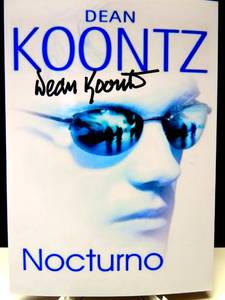 lot 104 image: AUTHENTIC AUTOGRAPH - AWARD WINNING WRITER DEAN KOONTZ HAND SIGNED 5 X 7 PHOTO