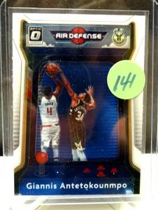 lot 141 image: 2020-21 Donruss Optic GIANNIS Antetokounmpo Purple Air Defense Prizm #1 Bucks