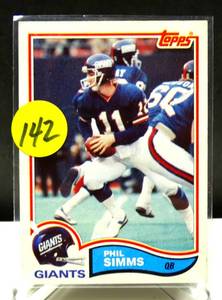 lot 142 image: 1982 Topps football card #433, PHIL SIMMS, New York Giants, HOFer - NMMT