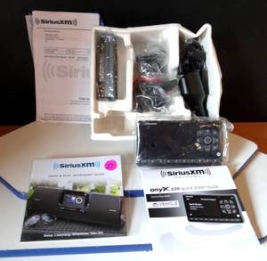 lot 27 image: SiriusXM Onyx EZR with Vehicle Kit - Black - SXEZR1V1KC - NEWNO BOX