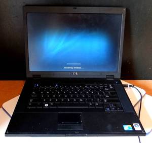 lot 39 image: DELL DUO CORE LAPTOP COMPUTER & CHARGER (SEE PICS FOR FEATURES) TESTEDWORKS