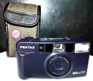 lot 102 image: Pentax IQZoom 735 35mm Film Camera wLeather Case