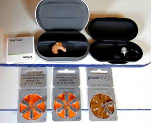 lot 112 image: OTIGON HEARING AIDS WITH BATTERIES AND CASE AS SHOWN