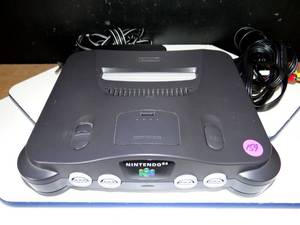lot 159 image: NINTENDO 64 NUS-001 GAMING SYSTEM WITH WWF WAR ZONE (1996) GAME - UNTESTED