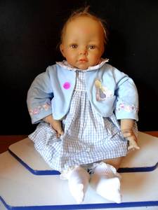 lot 183 image: LIFELIKE DOLL WITH Y NOOPS WK A.D.G. 06
