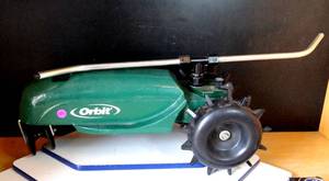 lot 249 image: Orbit 13,500 sq. ft. Traveling Garden Sprinkler - Cast Metal