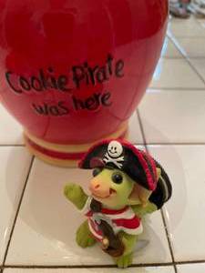 lot 35 image: RMs Pocket Dragon Cookie Jar &amp Pirate figure