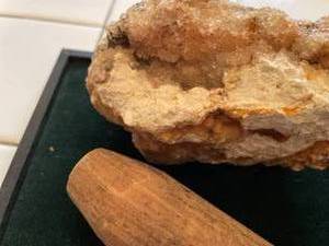 lot 56 image: Anybodys guess wooden tool plus decor rock