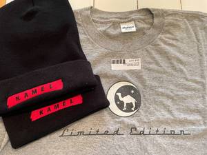 lot 70 image: Kamel Limited Edition T shirt XL and 2 stocking caps