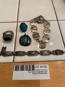 lot 139 image: Vintage silver &amp silver tone jewelry - 2 Native American bracelets 2 stone center rings &amp 1pendant wturquois stone