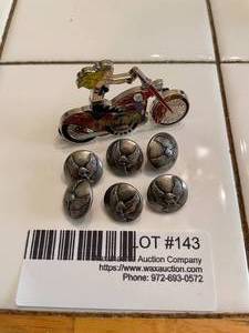 lot 143 image: Harley Davidson Emblem metal buttons (6) and Hard Rock motorcycle chick pin&nbsp