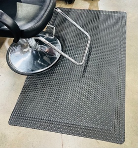 lot 76 image: Black Multi-Density Salon Mat