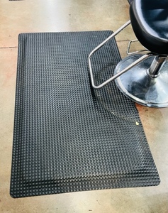 lot 104 image: Black Multi-Density Salon Mat