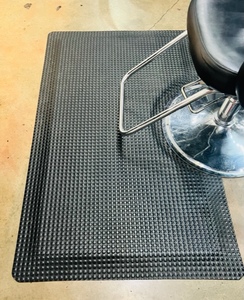 lot 107 image: Black Multi-Density Salon Mat