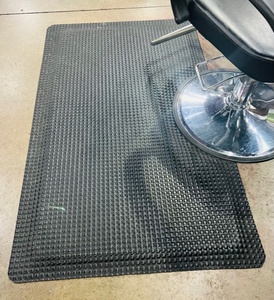 lot 110 image: Black Multi-Density Salon Mat