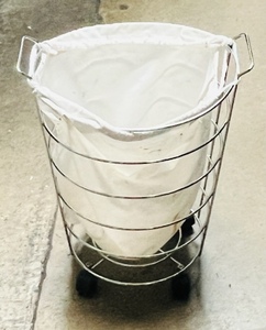lot 119 image: Metal Roll A Round Laundry Cart