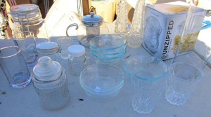lot 38 image: NEW  candy bowlby UNZIPPED, 2 bud vases, clear glass bowls, 2 juice glasses, Tea pot w Diffuser and more