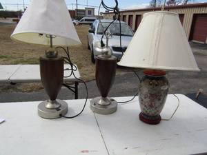 lot 98 image: 2 brown lamps with outlet in base and 1 floral lamp