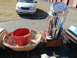 lot 107 image: Wicker basket, red bucket basket, Silver trashcan, Wicker basket with santa lid