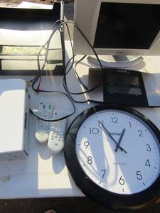 lot 132 image: Sky con wall clock 14 Sky moon atomic clock , sharp TV 14 screen Sony digital photo printer