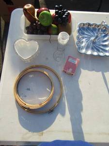 lot 138 image: Silver appetizer tray, wooden fruit ( Apples grapes & bananas etc.) Heart shaped candy dish and wooded circles