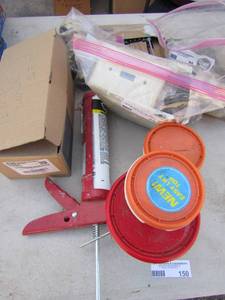 lot 150 image: Repair lot- wood filler, patch platter, used door knoblock, caulking gun electric wall plugs, light inserts