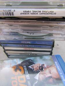 lot 151 image: NEW Microsoft surface dock and assorted DVDs and blue rays
