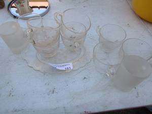 lot 161 image: Tea set. 8 cups, 1 plate, 2 frosted mini mugs