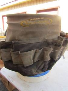 lot 180 image: Tool bucket with tool holder, screwdrivers, scrapers, small jack and more