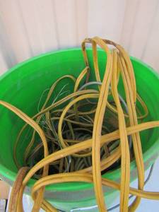 lot 185 image: Bucket of wires and extension cord