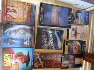 lot 212 image: Box of VHS and DVDs- life of the party, Mr Brooks, Nick of time and more