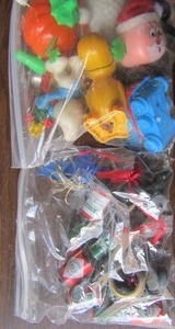 lot 231 image: Wind up toys, mini kitchen utensils, mini tabasco bottles